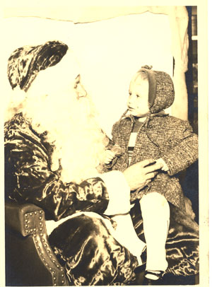 Photo of Santa and little girl